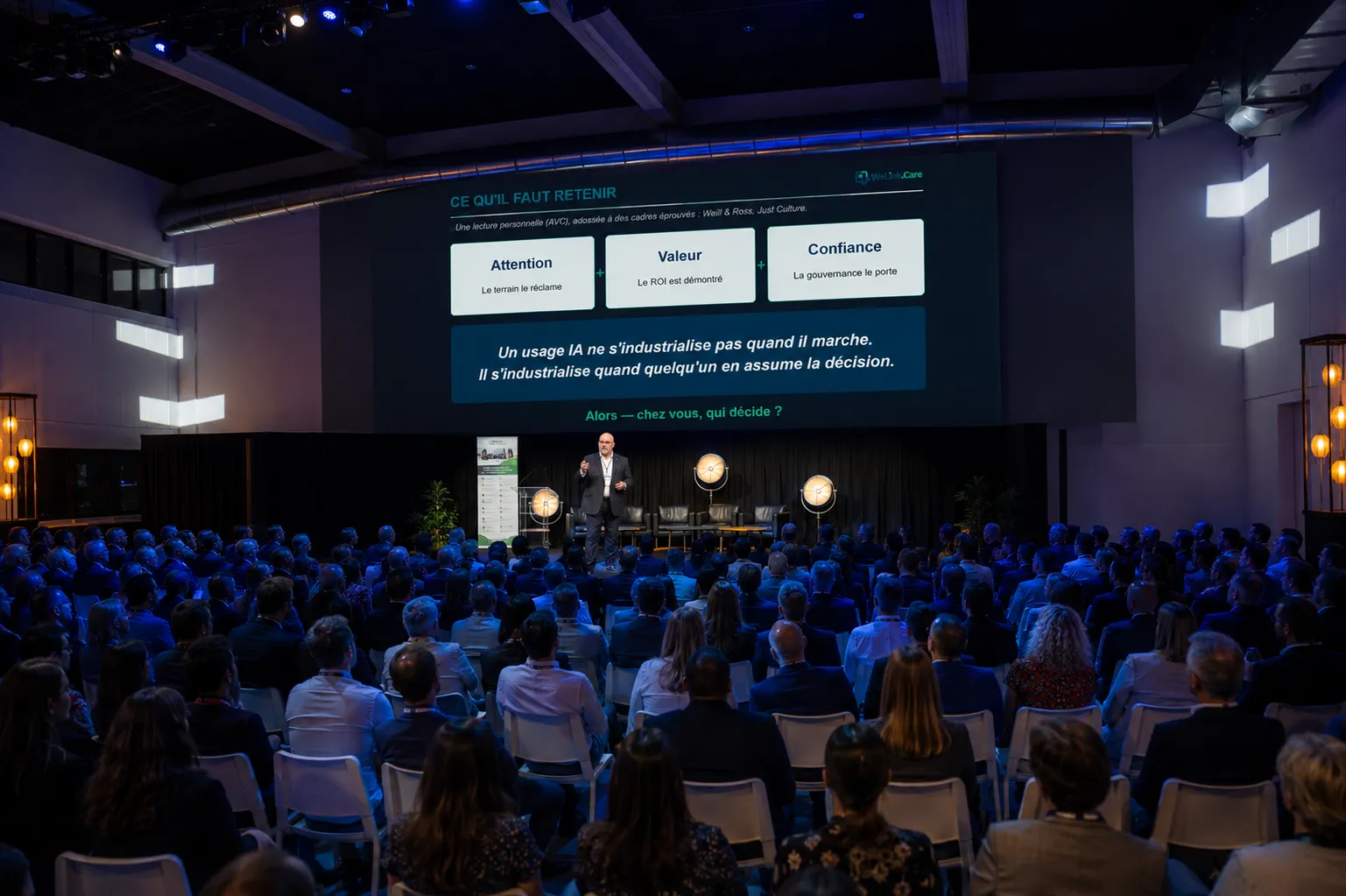 Keynote, in front of a room of executives and professionals.